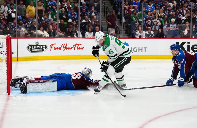 May 17, 2024; Denver, Colorado, USA; Dallas Stars center Matt Duchene (95) attempts on Colorado Avalanche goaltender Alexandar Georgiev (40) in double overtime period in game six of the second round of the 2024 Stanley Cup Playoffs at Ball Arena. Mandatory Credit: Ron Chenoy-USA TODAY Sports