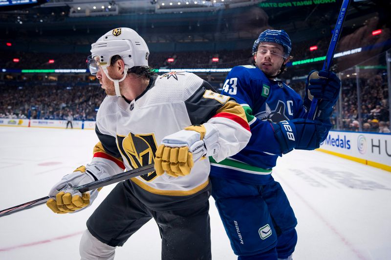 Nov 30, 2023; Vancouver, British Columbia, CAN; Vegas Golden Knights forward Jonathan Marchessault (81) battles with Vancouver Canucks defenseman Quinn Hughes (43) in the first period at Rogers Arena. Mandatory Credit: Bob Frid-USA TODAY Sports