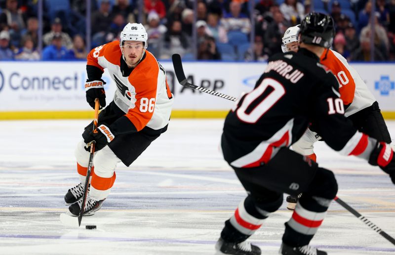 Nov 3, 2023; Buffalo, New York, USA;  Philadelphia Flyers left wing Joel Farabee (86) skates up ice with the puck during the first period against the Buffalo Sabres at KeyBank Center. Mandatory Credit: Timothy T. Ludwig-USA TODAY Sports