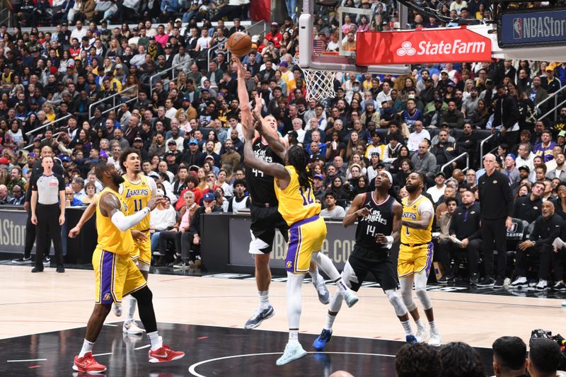 LOS ANGELES, CA - FEBRUARY 28: Mason Plumlee #44 of the LA Clippers dunks the ball during the game against the Los Angeles Lakers on February 28, 2024 at Crypto.Com Arena in Los Angeles, California. NOTE TO USER: User expressly acknowledges and agrees that, by downloading and/or using this Photograph, user is consenting to the terms and conditions of the Getty Images License Agreement. Mandatory Copyright Notice: Copyright 2024 NBAE (Photo by Andrew D. Bernstein/NBAE via Getty Images)