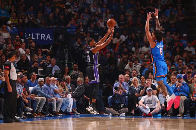 OKLAHOMA CITY, OK - APRIL 9: Keegan Murray #13 of the Sacramento Kings shoots the ball during the game against the Oklahoma City Thunder  on April 9, 2024 at Paycom Arena in Oklahoma City, Oklahoma. NOTE TO USER: User expressly acknowledges and agrees that, by downloading and or using this photograph, User is consenting to the terms and conditions of the Getty Images License Agreement. Mandatory Copyright Notice: Copyright 2024 NBAE (Photo by Zach Beeker/NBAE via Getty Images)