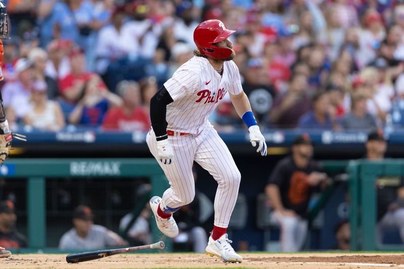 Aug 22, 2023; Philadelphia, Pennsylvania, USA; Philadelphia Phillies designated hitter Bryce Harper (3) hits a two RBI home run against the San Francisco Giants during the first inning at Citizens Bank Park. Mandatory Credit: Bill Streicher-USA TODAY Sports