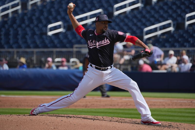 Feb 28, 2024; West Palm Beach, Florida, USA;  Washington Nationals pitcher Luis Perdomo (56) pitches against the Boston Red Sox in the third inning at The Ballpark of the Palm Beaches. Mandatory Credit: Jim Rassol-USA TODAY Sports