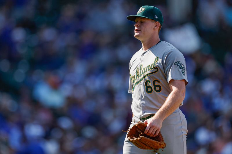 Sep 18, 2024; Chicago, Illinois, USA; Oakland Athletics starting pitcher Brady Basso (66) reacts as he leaves a baseball game against the Chicago Cubs during the fifth inning at Wrigley Field. Mandatory Credit: Kamil Krzaczynski-Imagn Images