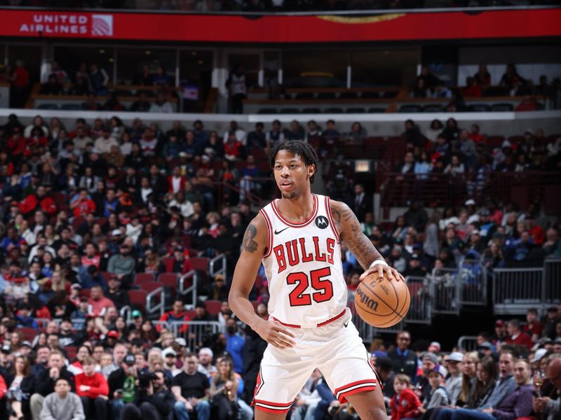 CHICAGO, IL - MARCH 11: Dalen Terry #25 of the Chicago Bulls handles the ball during the game against the Dallas Mavericks on March 11, 2024 at United Center in Chicago, Illinois. NOTE TO USER: User expressly acknowledges and agrees that, by downloading and or using this photograph, User is consenting to the terms and conditions of the Getty Images License Agreement. Mandatory Copyright Notice: Copyright 2024 NBAE (Photo by Jeff Haynes/NBAE via Getty Images)