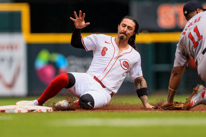 Jun 23, 2024; Cincinnati, Ohio, USA; Cincinnati Reds second baseman Jonathan India (6) slides into third on a RBI single hit by third baseman Santiago Espinal (not pictured) in the sixth inning against the Boston Red Sox at Great American Ball Park. Mandatory Credit: Katie Stratman-USA TODAY Sports