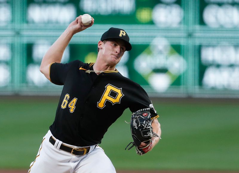 Sep 30, 2023; Pittsburgh, Pennsylvania, USA; Pittsburgh Pirates starting pitcher Quinn Priester (64) delivers a pitch against the Miami Marlins during the first inning at PNC Park. Mandatory Credit: Charles LeClaire-USA TODAY Sports