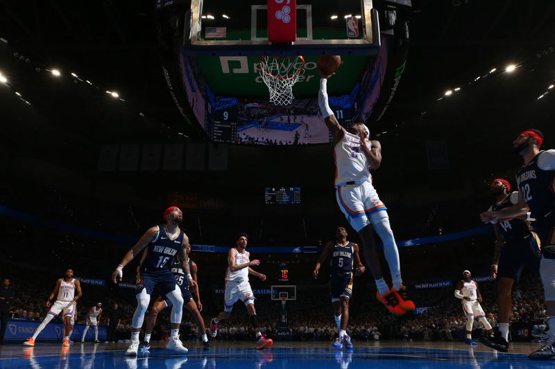 OKLAHOMA CITY, OK - APRIL 21:  Shai Gilgeous-Alexander #2 of the Oklahoma City Thunder goes to the basket during the game against the New Orleans Pelicans during Round 1 Game 1 of the 2024 NBA Playoffs on April 21, 2024 at Paycom Arena in Oklahoma City, Oklahoma. NOTE TO USER: User expressly acknowledges and agrees that, by downloading and or using this photograph, User is consenting to the terms and conditions of the Getty Images License Agreement. Mandatory Copyright Notice: Copyright 2024 NBAE (Photo by Zach Beeker/NBAE via Getty Images)