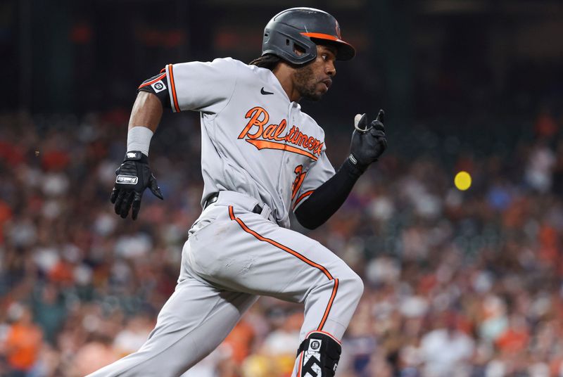 Sep 18, 2023; Houston, Texas, USA; Baltimore Orioles center fielder Cedric Mullins (31) runs to first base on an RBI double during the seventh inning against the Houston Astros at Minute Maid Park. Mandatory Credit: Troy Taormina-USA TODAY Sports