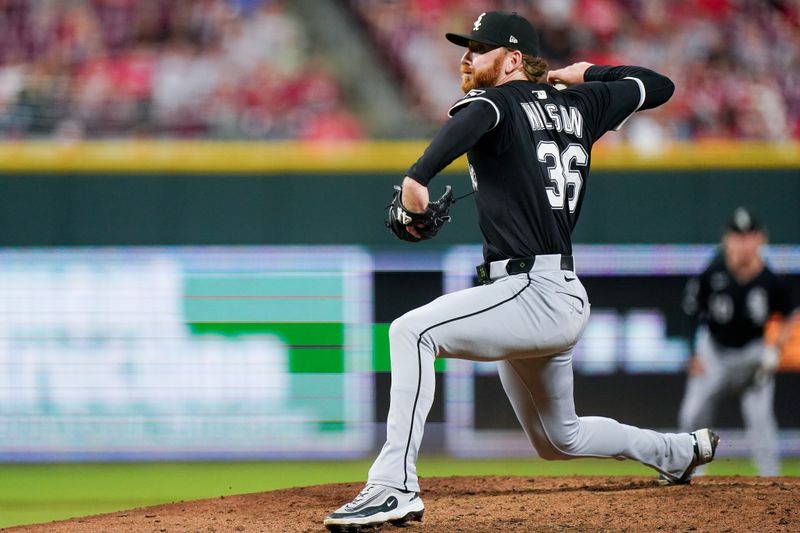 May 14, 2025; Cincinnati, Ohio, USA; Chicago White Sox pitcher Steven Wilson (36) throws a pitch in the eighth inning of the MLB interleague game between the Cincinnati Reds and Chicago White Sox. Mandatory Credit: Frank Bowen IV-Imagn Images
