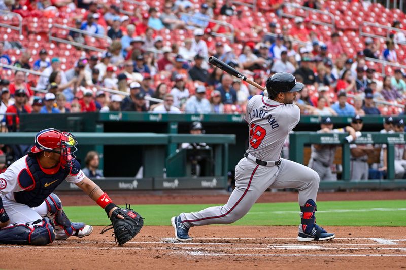 Jun 26, 2024; St. Louis, Missouri, USA;  Atlanta Braves right fielder Ramon Laureano (18) drives in a run against the St. Louis Cardinals during the second inning at Busch Stadium. Mandatory Credit: Jeff Curry-USA TODAY Sports