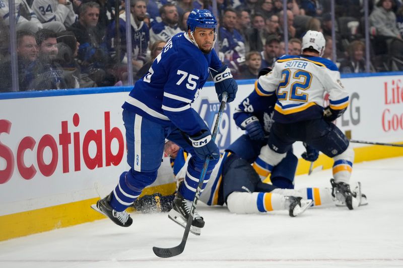 Oct 24, 2024; Toronto, Ontario, CAN; Toronto Maple Leafs forward Ryan Reaves (75) skates against the St. Louis Blues during the third period at Scotiabank Arena. Mandatory Credit: John E. Sokolowski-Imagn Images