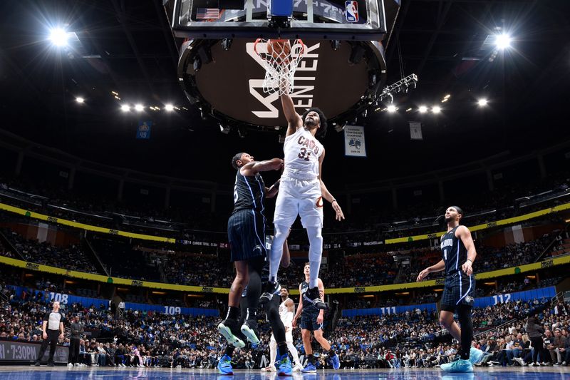 ORLANDO, FL - JANUARY 22: Jarrett Allen #31 of the Cleveland Cavaliers dunks the ball during the game against the Orlando Magic on January 22, 2024 at Kia Center in Orlando, Florida. NOTE TO USER: User expressly acknowledges and agrees that, by downloading and or using this photograph, User is consenting to the terms and conditions of the Getty Images License Agreement. Mandatory Copyright Notice: Copyright 2024 NBAE (Photo by Fernando Medina/NBAE via Getty Images)