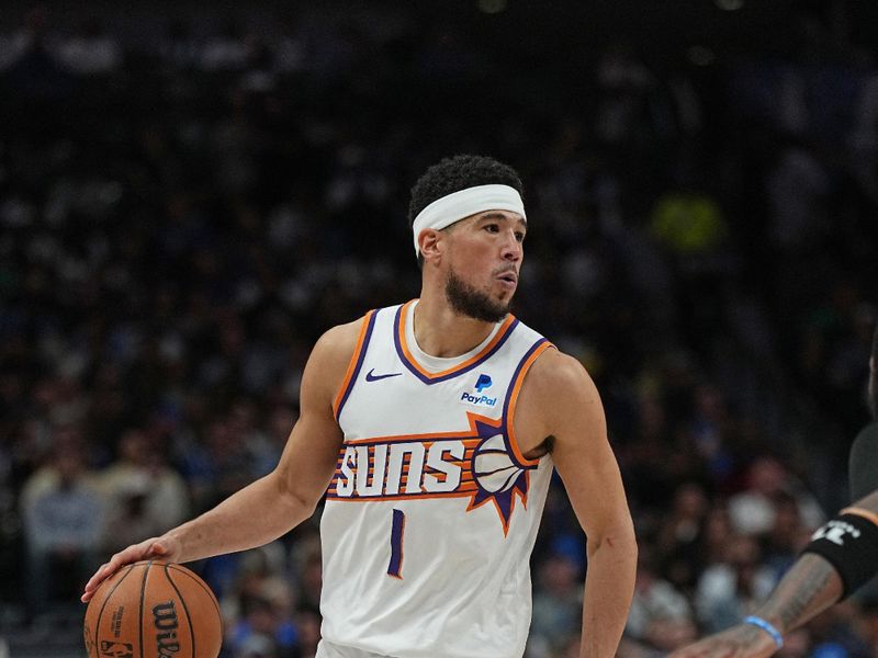 DALLAS, TX - FEBRUARY 22: Devin Booker #1 of the Phoenix Suns looks on during the game against the Dallas Mavericks on February 22, 2024 at the American Airlines Center in Dallas, Texas. NOTE TO USER: User expressly acknowledges and agrees that, by downloading and or using this photograph, User is consenting to the terms and conditions of the Getty Images License Agreement. Mandatory Copyright Notice: Copyright 2024 NBAE (Photo by Glenn James/NBAE via Getty Images)