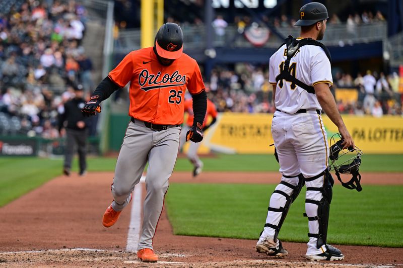 Apr 6, 2024; Pittsburgh, Pennsylvania, USA; Baltimore Orioles outfielder Anthony Santander (25) scores a run during the seventh inning against the Pittsburgh Pirates at PNC Park. Mandatory Credit: David Dermer-USA TODAY Sports