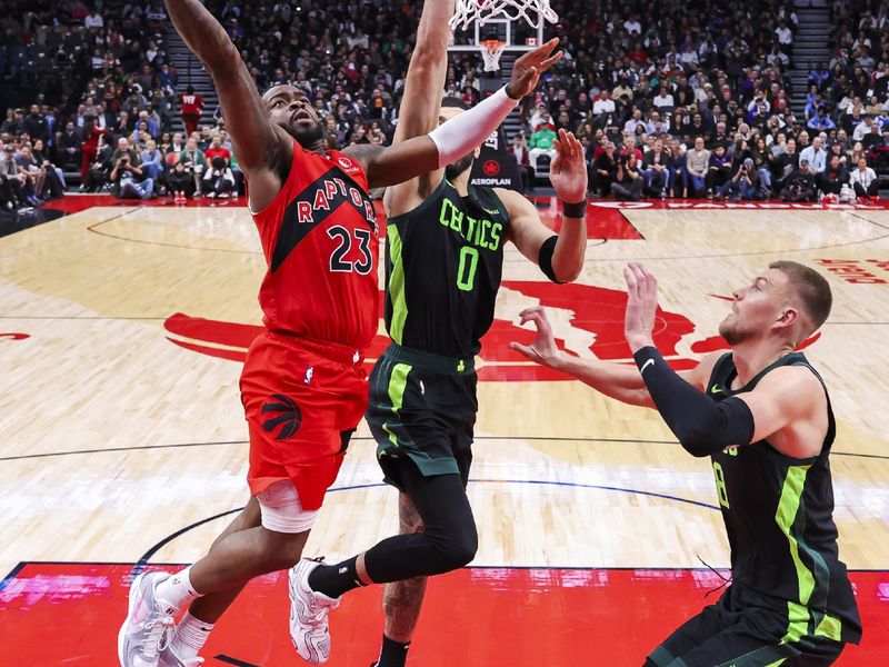 TORONTO, CANADA - JANUARY 15: Jamal Shead #23 of the Toronto Raptors drives to the basket during the game against the Boston Celtics on January 15, 2025 at the Scotiabank Arena in Toronto, Ontario, Canada.  NOTE TO USER: User expressly acknowledges and agrees that, by downloading and or using this Photograph, user is consenting to the terms and conditions of the Getty Images License Agreement.  Mandatory Copyright Notice: Copyright 2025 NBAE (Photo by Vaughn Ridley/NBAE via Getty Images)