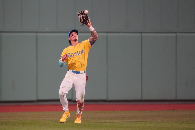 Jul 27, 2024; Boston, Massachusetts, USA; Boston Red Sox center fielder Jarren Duran (16) catches a sacrifice fly ball hit by New York Yankees third baseman Oswaldo Cabrera (not pictured) during the seventh inning at Fenway Park. Mandatory Credit: Gregory Fisher-USA TODAY Sports