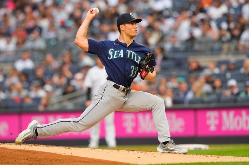 Jun 22, 2023; Bronx, New York, USA; Seattle Mariners pitcher Bryan Woo (33) delivers a pitch against the New York Yankees during the first inning at Yankee Stadium. Mandatory Credit: Gregory Fisher-USA TODAY Sports