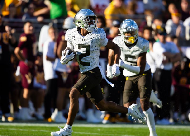 Nov 18, 2023; Tempe, Arizona, USA; Oregon Ducks wide receiver Gary Bryant Jr. (2) catches a pass for a touchdown against the Arizona State Sun Devils in the first half at Mountain America Stadium. Mandatory Credit: Mark J. Rebilas-USA TODAY Sports