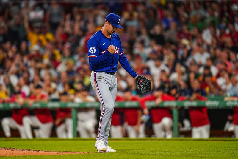 Aug 12, 2024; Boston, Massachusetts, USA; Texas Rangers starting pitcher Tyler Mahle (51) reacts after the final out against the Boston Red Sox in the fourth inning at Fenway Park. Mandatory Credit: David Butler II-USA TODAY Sports