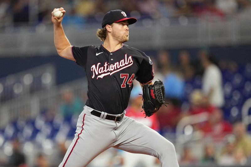 Aug 26, 2023; Miami, Florida, USA;  Washington Nationals starting pitcher Jake Irvin (74) pitches against the Miami Marlins in the first inning at loanDepot Park. Mandatory Credit: Jim Rassol-USA TODAY Sports