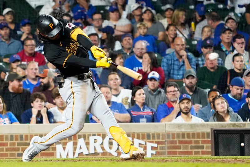 Sep 21, 2023; Chicago, Illinois, USA; Pittsburgh Pirates designated hitter Connor Joe (2) hits a one run single against the Chicago Cubs during the eighth inning at Wrigley Field. Mandatory Credit: David Banks-USA TODAY Sports