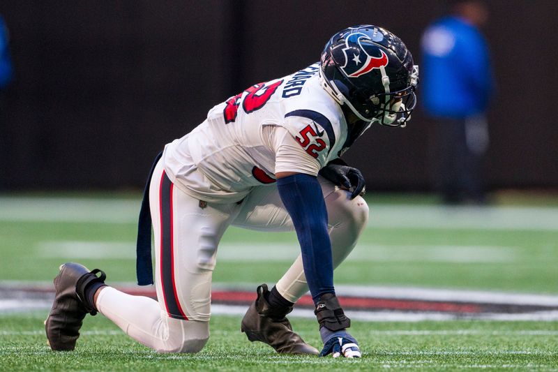 Houston Texans defensive end Jonathan Greenard (52) lines up during the first half of an NFL football game against the Atlanta Falcons, Sunday, Oct. 8, 2023, in Atlanta. The Atlanta Falcons won 21-19. (AP Photo/Danny Karnik)