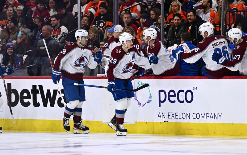 Jan 20, 2024; Philadelphia, Pennsylvania, USA; Colorado Avalanche center Nathan MacKinnon (29) celebrates with teammates after scoring a goal against the Philadelphia Flyers in the second period at Wells Fargo Center. Mandatory Credit: Kyle Ross-USA TODAY Sports