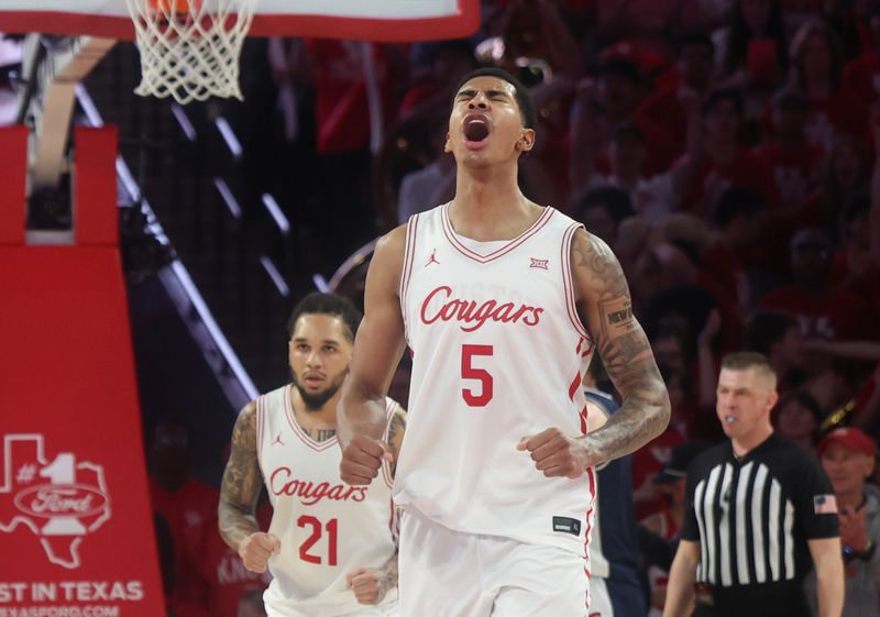 Feb 21, 2026; Houston, Texas, USA;  Houston Cougars center Chris Cenac Jr. (5) reacts while playing against the Arizona Wildcats in the second half at Fertitta Center. Mandatory Credit: Thomas Shea-Imagn Images