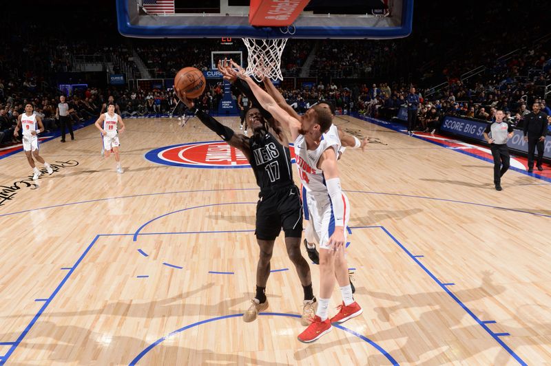 DETROIT, MI - MARCH 7: Dennis Schroder #17 of the Brooklyn Nets shoots the ball during the game against the Detroit Pistons on March 7, 2024 at Little Caesars Arena in Detroit, Michigan. NOTE TO USER: User expressly acknowledges and agrees that, by downloading and/or using this photograph, User is consenting to the terms and conditions of the Getty Images License Agreement. Mandatory Copyright Notice: Copyright 2024 NBAE (Photo by Chris Schwegler/NBAE via Getty Images)