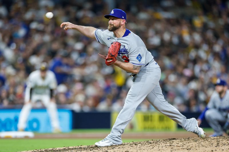 Jun 9, 2025; San Diego, California, USA; Los Angeles Dodgers relief pitcher Kirby Yates (38) throws a pitch during the ninth inning against the San Diego Padres at Petco Park. Mandatory Credit: David Frerker-Imagn Images
