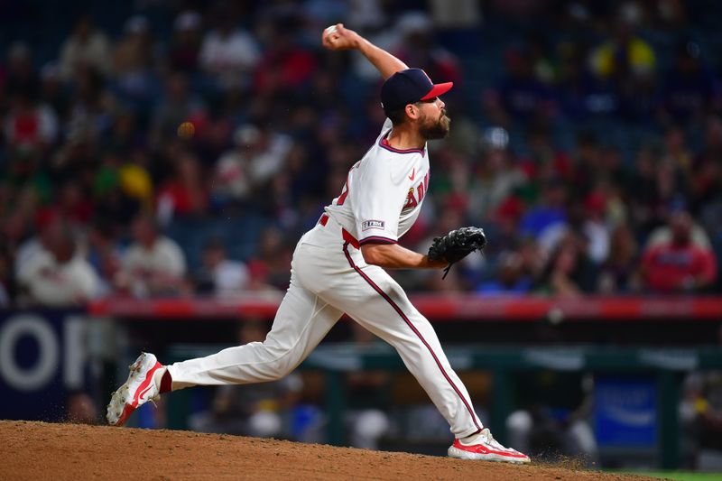 Jul 26, 2024; Anaheim, California, USA; Los Angeles Angels pitcher Matt Moore (55) throws against the Oakland Athletics during the eighth inning at Angel Stadium. Mandatory Credit: Gary A. Vasquez-USA TODAY Sports