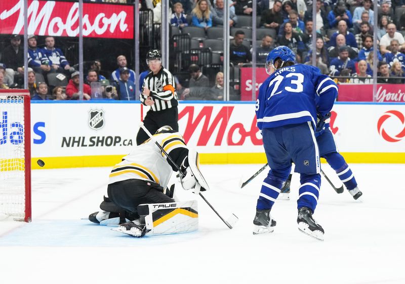 Nov 5, 2024; Toronto, Ontario, CAN; Toronto Maple Leafs left wing Matthew Knies (23) deflects a the puck and scores a goal Boston Bruins during the third period at Scotiabank Arena. Mandatory Credit: Nick Turchiaro-Imagn Imagess