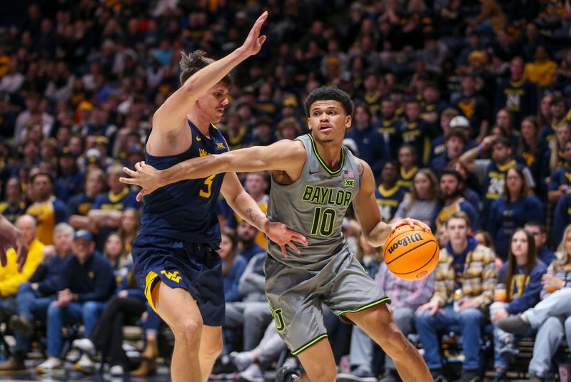 Feb 17, 2024; Morgantown, West Virginia, USA; Baylor Bears guard RayJ Dennis (10) drives baseline past West Virginia Mountaineers guard Kerr Kriisa (3) during the first half at WVU Coliseum. Mandatory Credit: Ben Queen-USA TODAY Sports