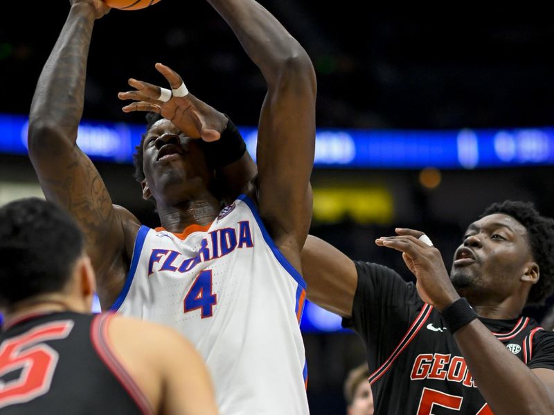 Mar 14, 2024; Nashville, TN, USA;  Georgia Bulldogs center Russel Tchewa (54) fouls Florida Gators forward Tyrese Samuel (4) during the second half at Bridgestone Arena. Mandatory Credit: Steve Roberts-USA TODAY Sports