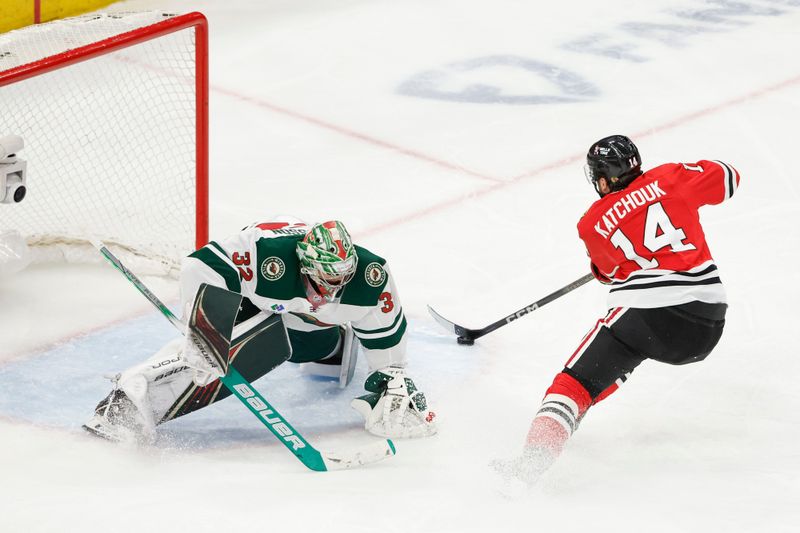 Feb 7, 2024; Chicago, Illinois, USA; Chicago Blackhawks left wing Boris Katchouk (14) tries to score against Minnesota Wild goaltender Filip Gustavsson (32) during the third period at United Center. Mandatory Credit: Kamil Krzaczynski-USA TODAY Sports