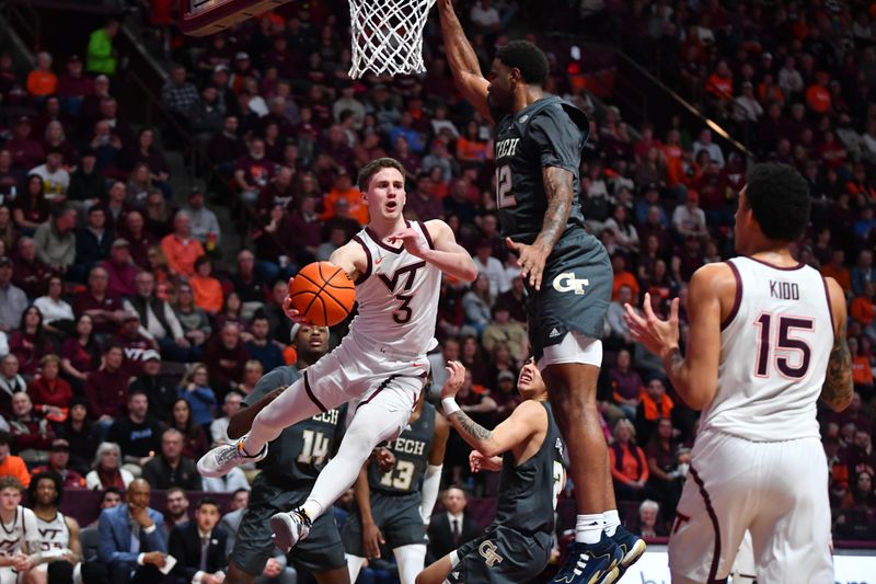 Jan 27, 2024; Blacksburg, Virginia, USA; Virginia Tech Hokies guard Sean Pedulla (3) passes the ball while being defended by Georgia Tech Yellow Jackets forward Tyzhaun Claude (12) during the second half at Cassell Coliseum. Mandatory Credit: Brian Bishop-USA TODAY Sports