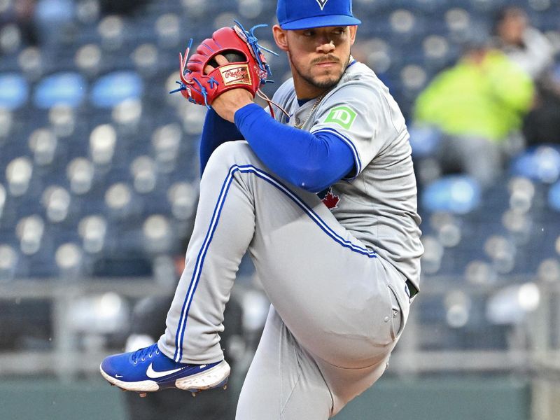 Apr 25, 2024; Kansas City, Missouri, USA;  Toronto Blue Jays starting pitcher Jose Berrios (17) delivers a pitch in the first inning against the Kansas City Royals at Kauffman Stadium. Mandatory Credit: Peter Aiken-USA TODAY Sports