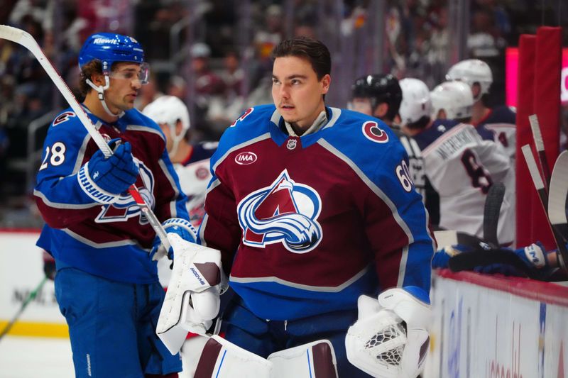 Oct 12, 2024; Denver, Colorado, USA; Colorado Avalanche goaltender Justus Annunen (60) prepares to enter the game during the second period against the Columbus Blue Jackets at Ball Arena. Mandatory Credit: Ron Chenoy-Imagn Images