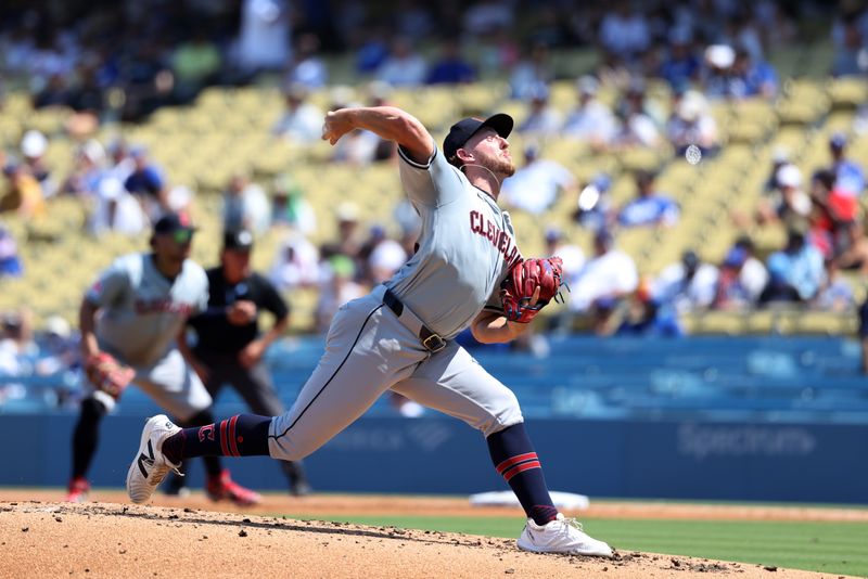 Sep 8, 2024; Los Angeles, California, USA;  Cleveland Guardians starting pitcher Tanner Bibee (28) pitches during the second inning against the Los Angeles Dodgers at Dodger Stadium. Mandatory Credit: Kiyoshi Mio-Imagn Images