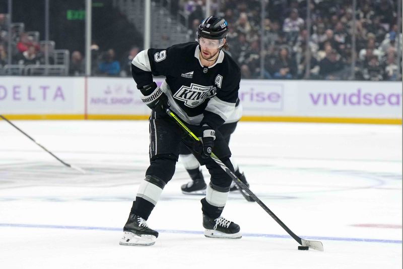 Nov 27, 2024; Los Angeles, California, USA; LA Kings right wing Adrian Kempe (9) handles the puck against the Winnipeg Jets in the first period at Crypto.com Arena. Mandatory Credit: Kirby Lee-Imagn Images