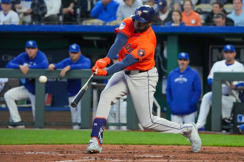 Apr 9, 2024; Kansas City, Missouri, USA; Houston Astros left fielder Yordan Alvarez (44) hits a one run double against the Kansas City Royals in the fourth inning at Kauffman Stadium. Mandatory Credit: Denny Medley-USA TODAY Sports