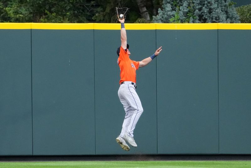 Jul 19, 2023; Denver, Colorado, USA; Houston Astros center fielder Jake Meyers (6) fields the ball to end game against the Colorado Rockies at Coors Field. Mandatory Credit: Ron Chenoy-USA TODAY Sports