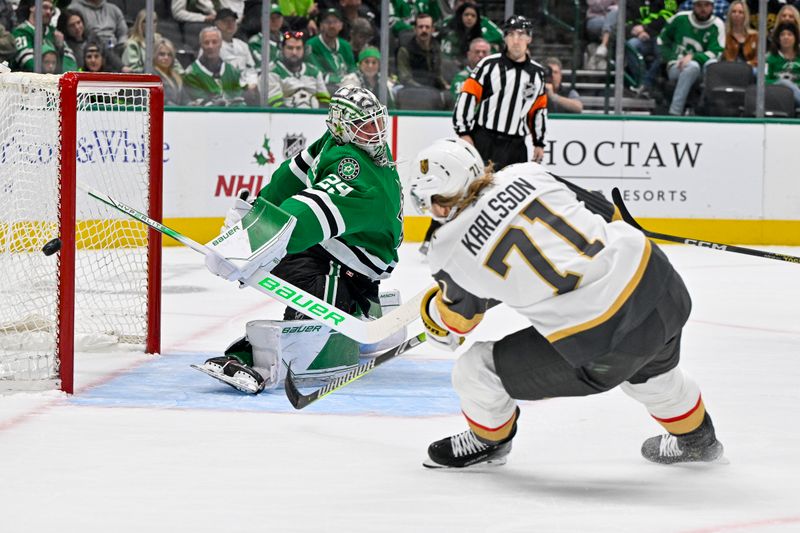 Dec 9, 2023; Dallas, Texas, USA; Dallas Stars goaltender Jake Oettinger (29) stops a breakaway shot by Vegas Golden Knights center William Karlsson (71) during the first period at the American Airlines Center. Mandatory Credit: Jerome Miron-USA TODAY Sports