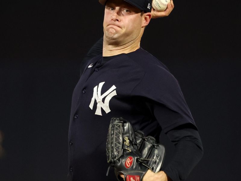 Mar 3, 2023; Tampa, Florida, USA;  New York Yankees starting pitcher Gerrit Cole (45) throws a pitch during the first inning against the Detroit Tigers at George M. Steinbrenner Field. Mandatory Credit: Kim Klement-USA TODAY Sports