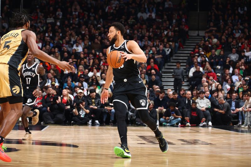 TORONTO, CANADA - FEBRUARY 22: Ben Simmons #10 of the Brooklyn Nets handles the ball during the game against the Toronto Raptors on February 22, 2024 at the Scotiabank Arena in Toronto, Ontario, Canada.  NOTE TO USER: User expressly acknowledges and agrees that, by downloading and or using this Photograph, user is consenting to the terms and conditions of the Getty Images License Agreement.  Mandatory Copyright Notice: Copyright 2024 NBAE (Photo by Vaughn Ridley/NBAE via Getty Images)