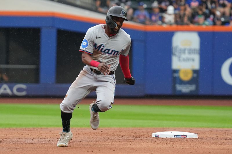 Aug 17, 2024; New York City, New York, USA; Miami Marlins second baseman Vidal Brujan (17) rounds second base during the third inning against New York Mets at Citi Field. Mandatory Credit: Lucas Boland-USA TODAY Sports