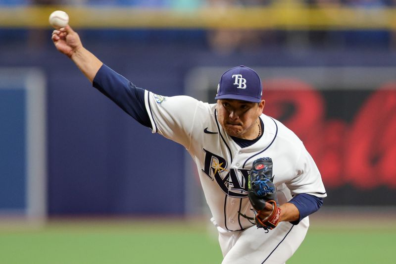 Aug 24, 2023; St. Petersburg, Florida, USA;  Tampa Bay Rays relief pitcher Erasmo Ramirez (61) throws a pitch against the Colorado Rockies in the fifth inning at Tropicana Field. Mandatory Credit: Nathan Ray Seebeck-USA TODAY Sports