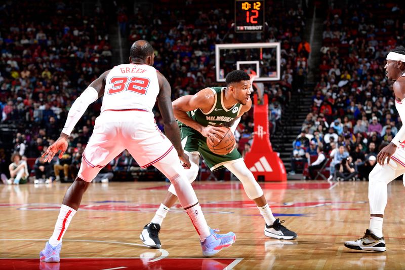 HOUSTON, TX - JANUARY 6: Giannis Antetokounmpo #34 of the Milwaukee Bucks handles the ball during the game against the Houston Rockets on January 6, 2024 at the Toyota Center in Houston, Texas. NOTE TO USER: User expressly acknowledges and agrees that, by downloading and or using this photograph, User is consenting to the terms and conditions of the Getty Images License Agreement. Mandatory Copyright Notice: Copyright 2024 NBAE (Photo by Logan Riely/NBAE via Getty Images)