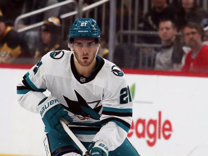 Nov 16, 2024; Pittsburgh, Pennsylvania, USA;  San Jose Sharks center Alexander Wennberg (21) skates up ice with the puck against the Pittsburgh Penguins during the second period at PPG Paints Arena. Mandatory Credit: Charles LeClaire-Imagn Images